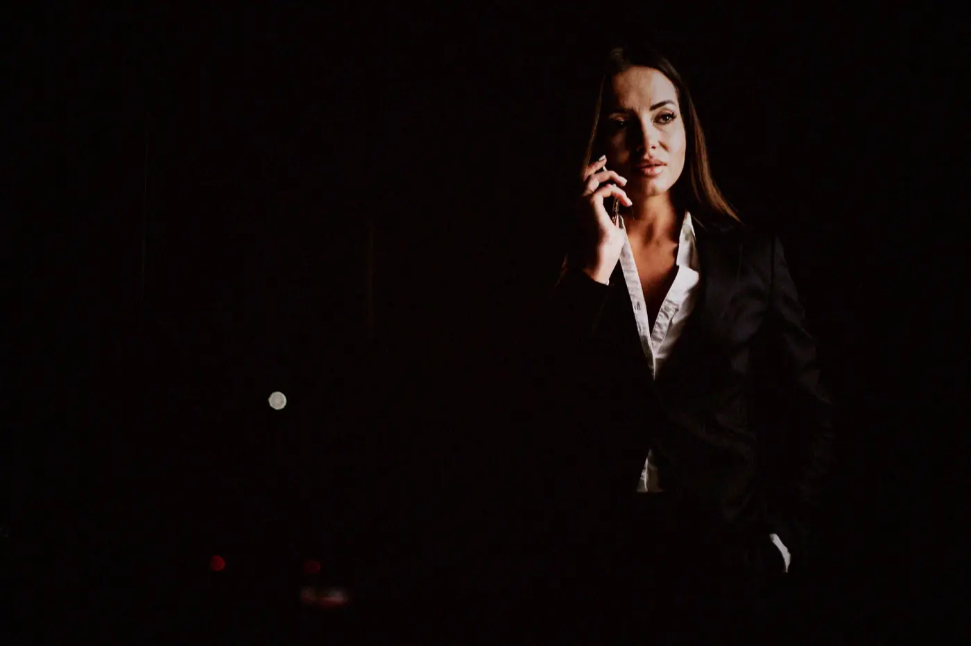 A manager on the phone late in an empty office, the call every supplier made in September 2025 when the orders stopped.